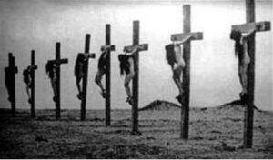 Junge Frauen, Armenierinnen, die von ihren türkischen Mördern gekreuzigt wurden. Eines der wenigen Originalbilder aus dem Geschehen in Armenien aus dem Völkermord.